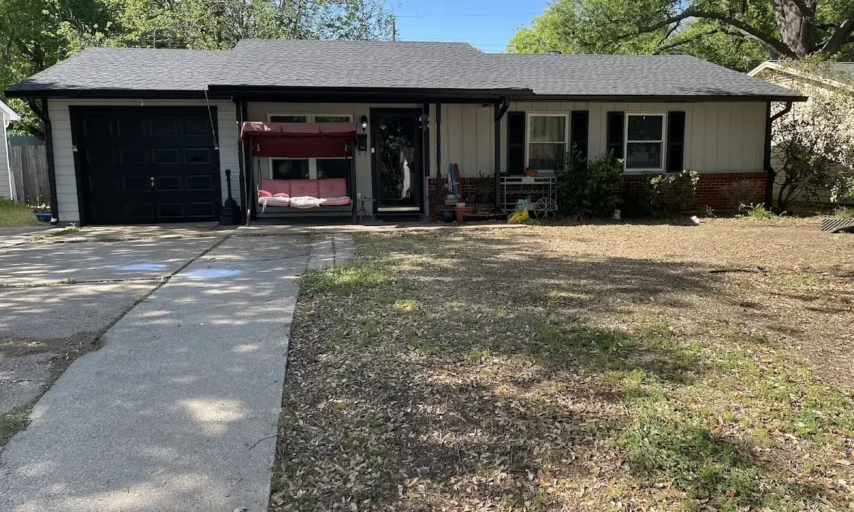 Asphalt Shingle Roof Repair crew at work on a residential roof in El Campo